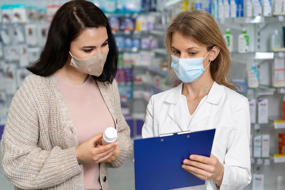 Medium shot pharmacist helping patient